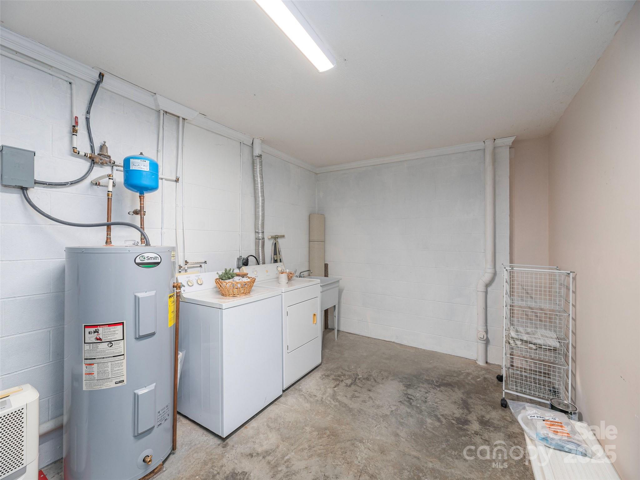 53 Vancott Court Clyde, NC 28721 - Photo 20 of 23 a utility room with dryer and washer