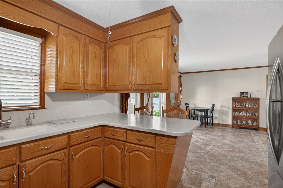 145 State Rd S-4-935 Pendleton, SC 29670 - Photo 42 of 47 A functional kitchen provides ample wood cabinetry and counter space, with convenient open-concept dining nearby.
