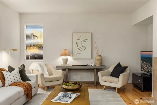 a living room with furniture and a window