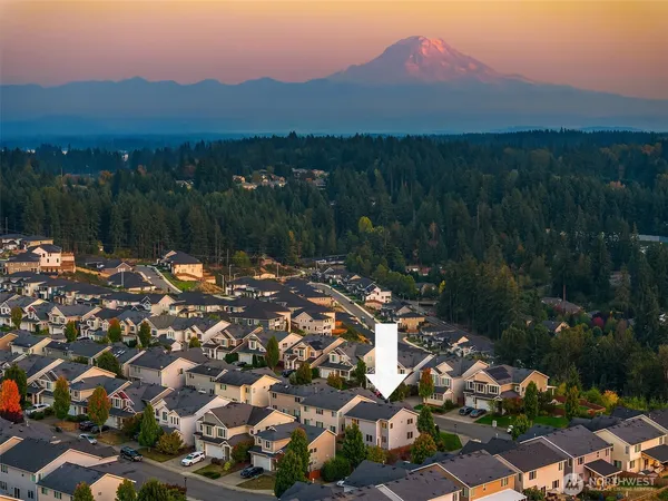 a view of a city with a lake