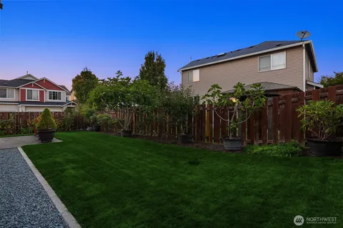 a backyard of a house with seating space