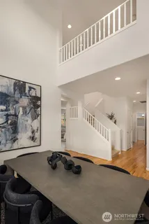 a view of a living room and dining room
