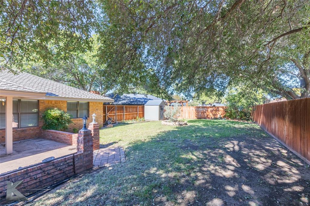 42 Riviera Circle Abilene, TX 79606 - Photo 35 of 39 a view of a yard in front of a house with large tree
