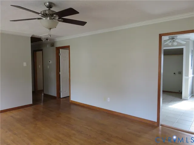 a view of hallway with a fan