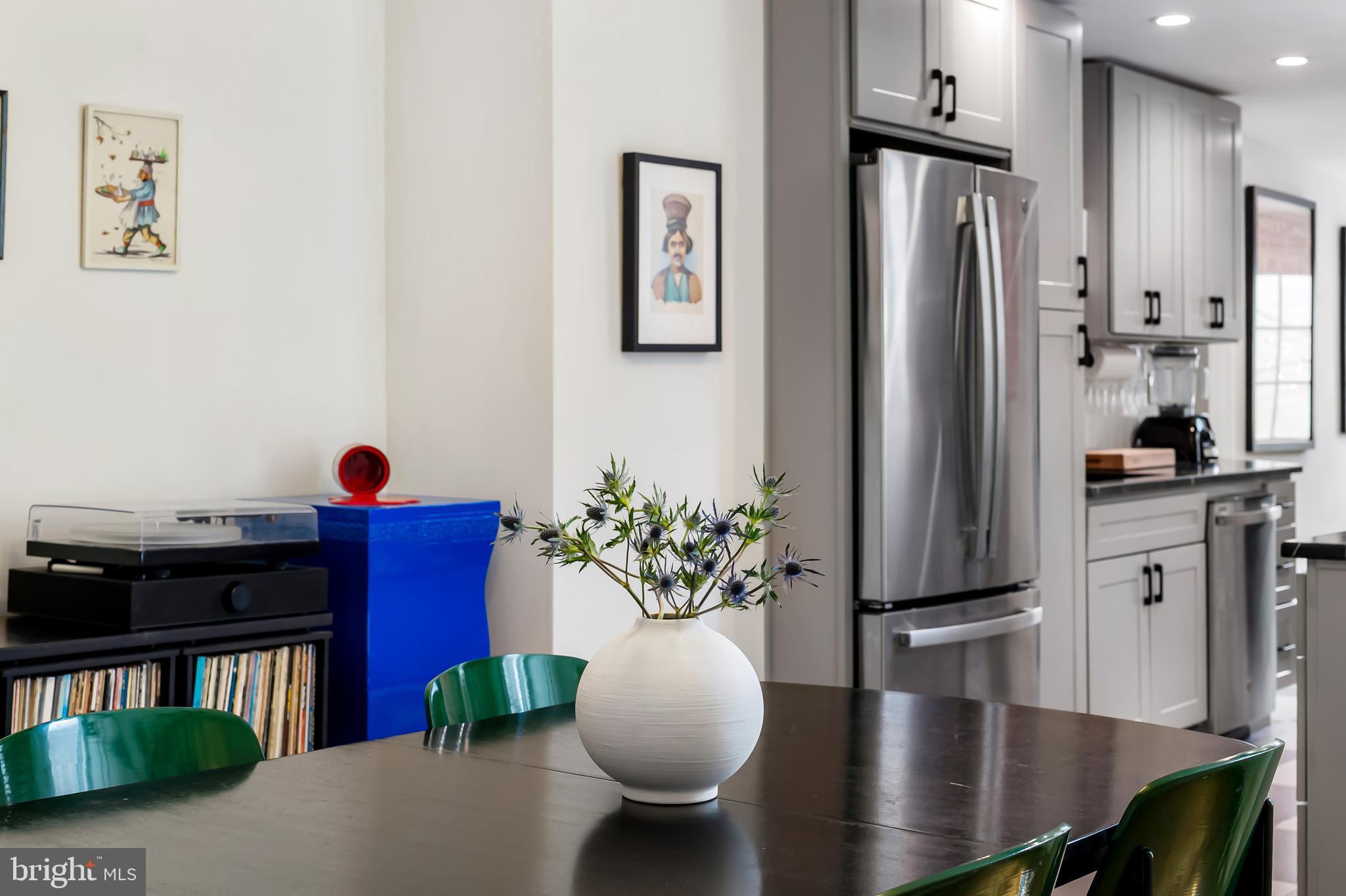 3409 Keswick Road Baltimore, MD 21211 - Photo 11 of 49 a vase of flowers sitting on a table