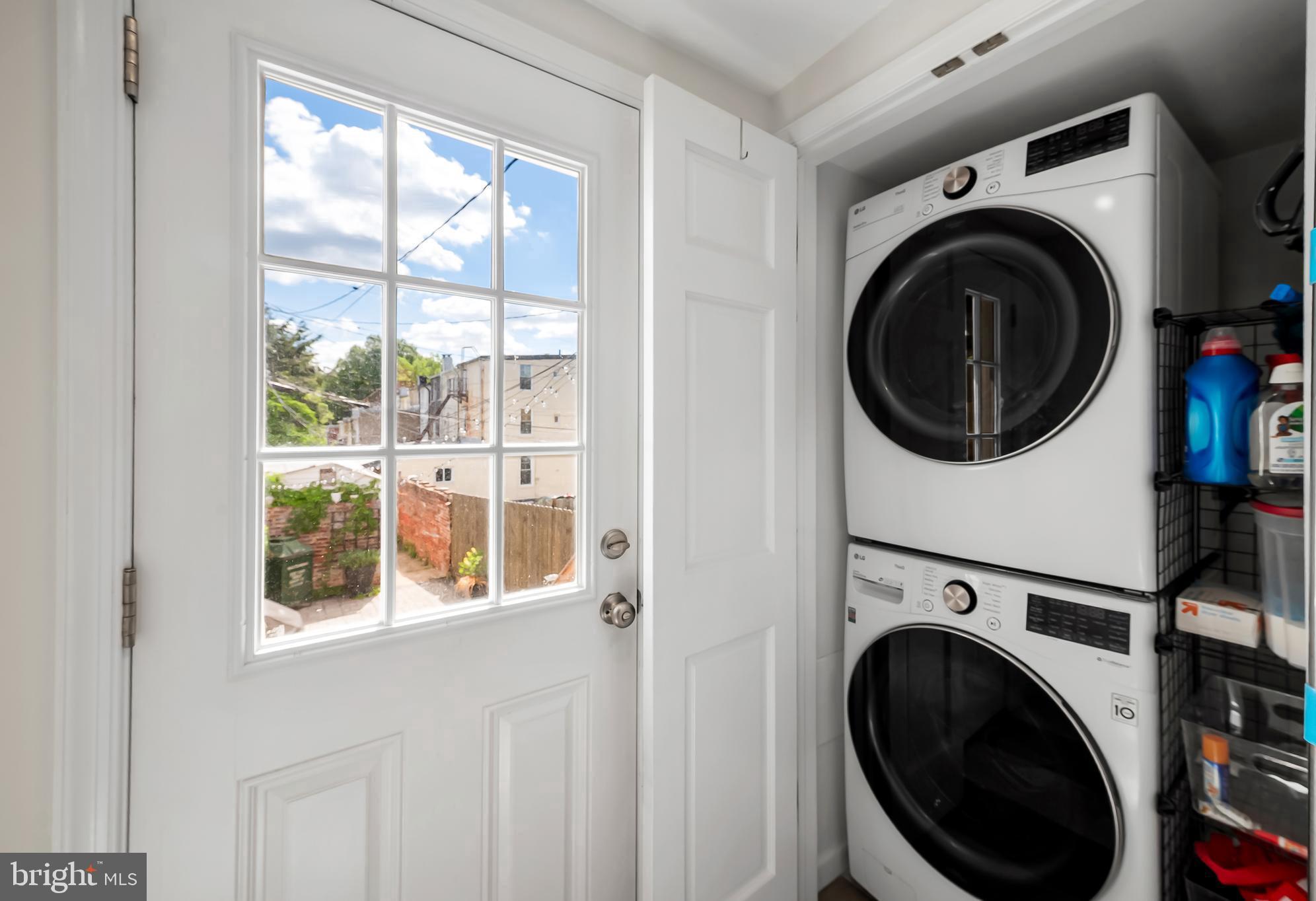 3409 Keswick Road Baltimore, MD 21211 - Photo 19 of 49 a view of a hallway with washer and dryer
