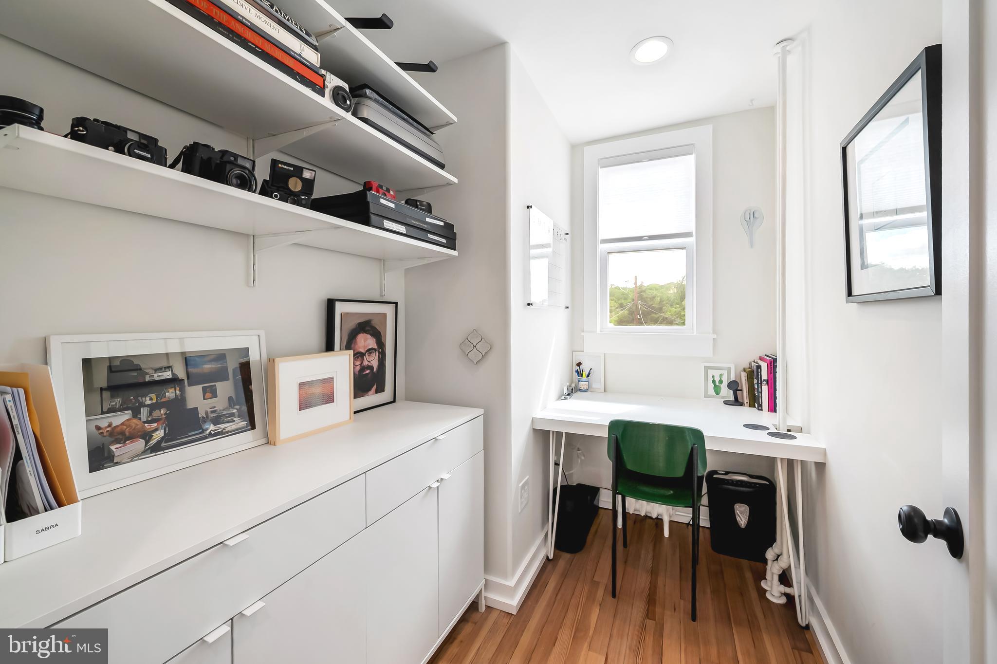 3409 Keswick Road Baltimore, MD 21211 - Photo 25 of 49 a view of a kitchen with furniture and wooden floor