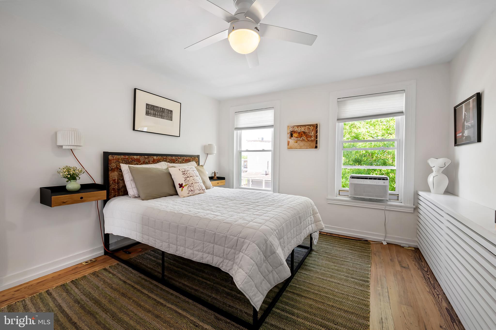 3409 Keswick Road Baltimore, MD 21211 - Photo 32 of 49 a bedroom with a bed and a window