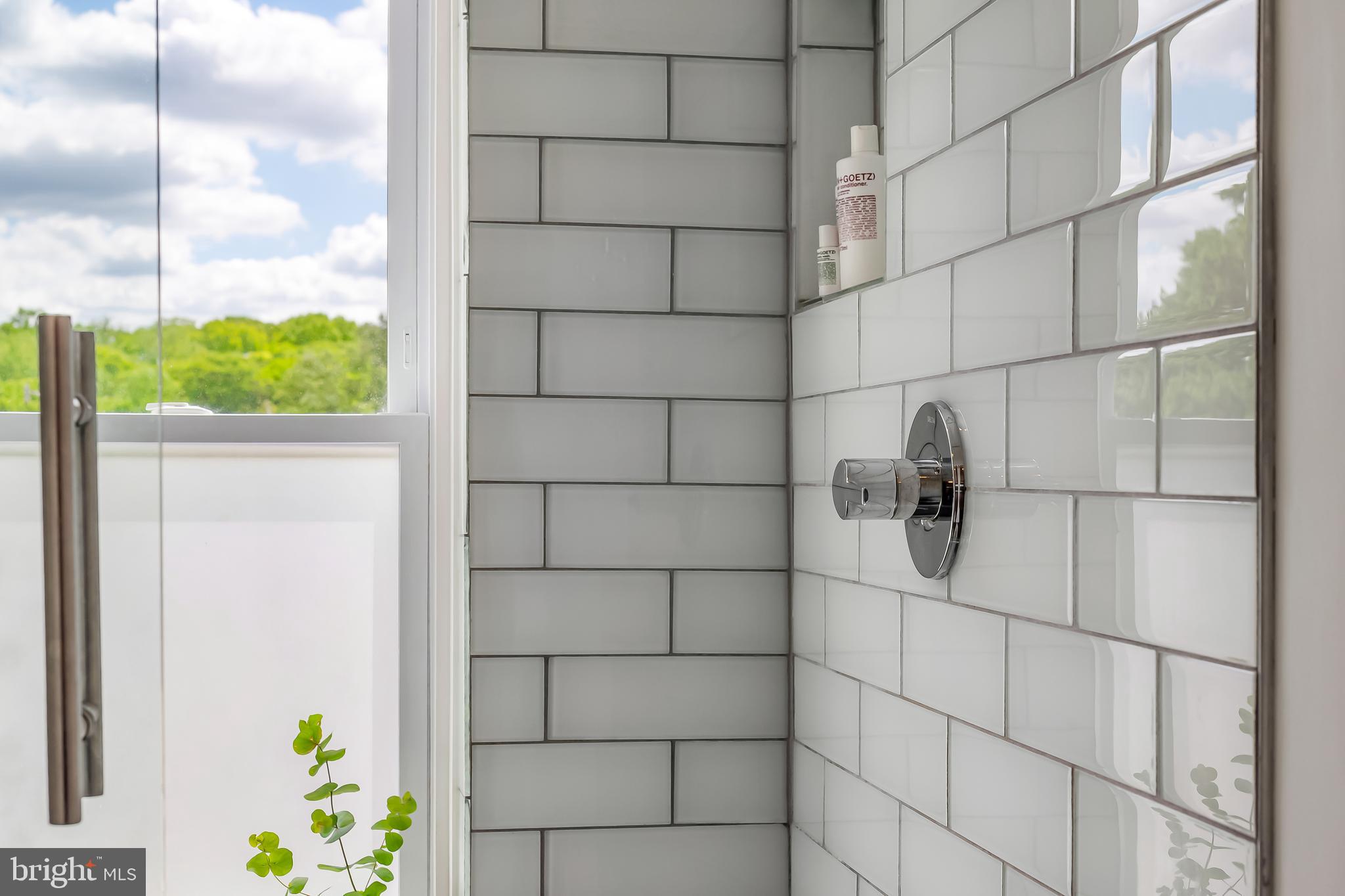 3409 Keswick Road Baltimore, MD 21211 - Photo 40 of 49 a bathroom with a shower