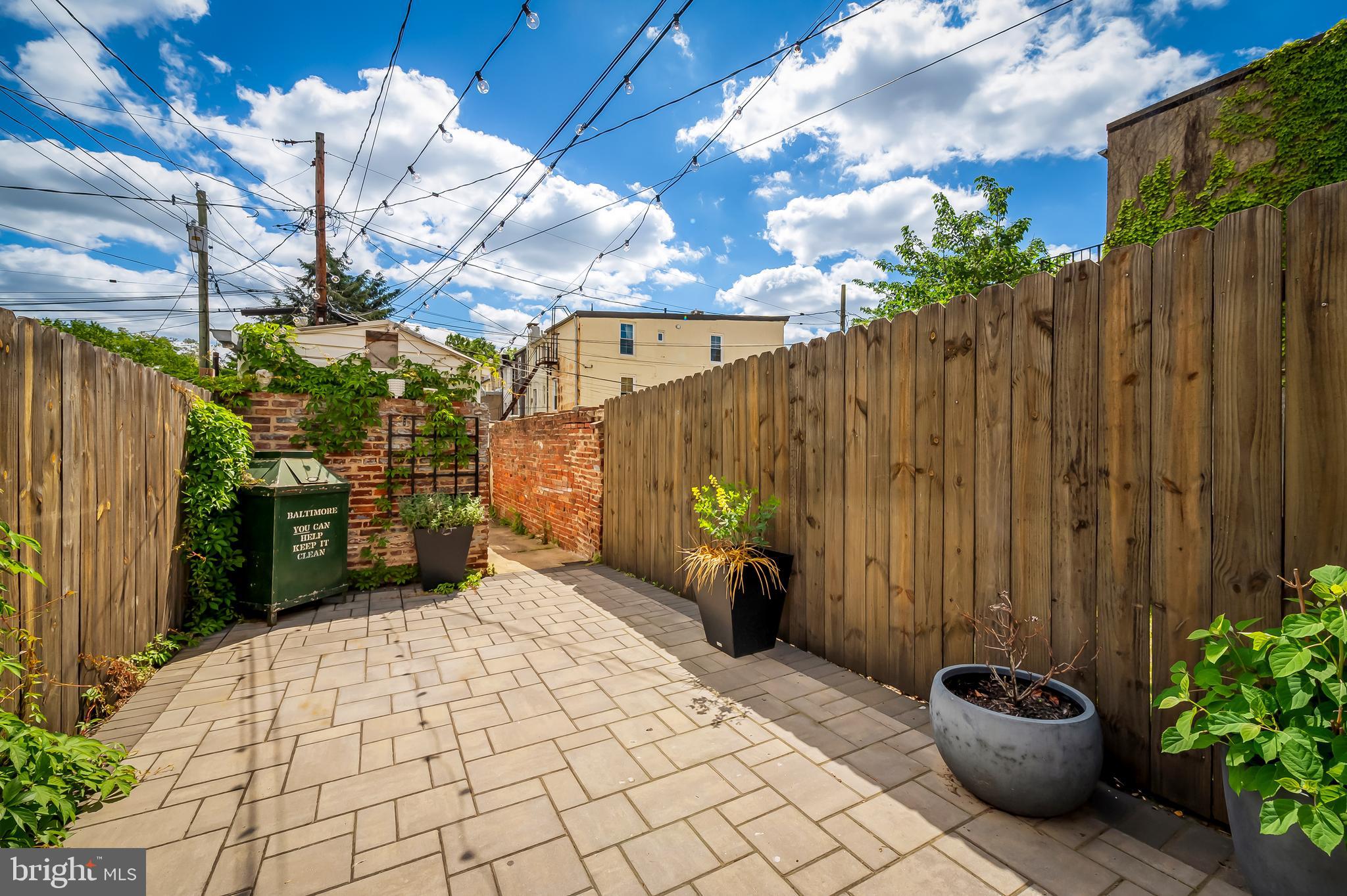 3409 Keswick Road Baltimore, MD 21211 - Photo 45 of 49 a view of a chairs and tables in patio
