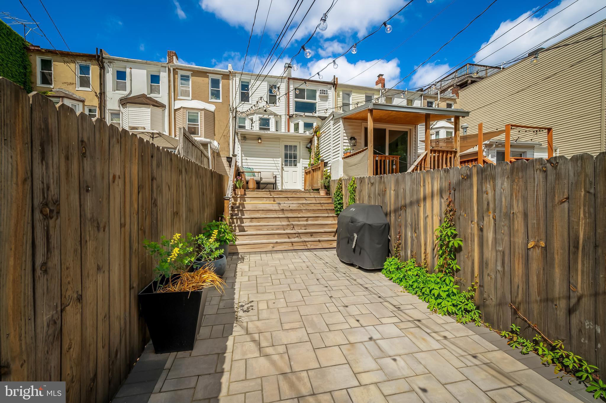 3409 Keswick Road Baltimore, MD 21211 - Photo 46 of 49 a front view of a house with a garden