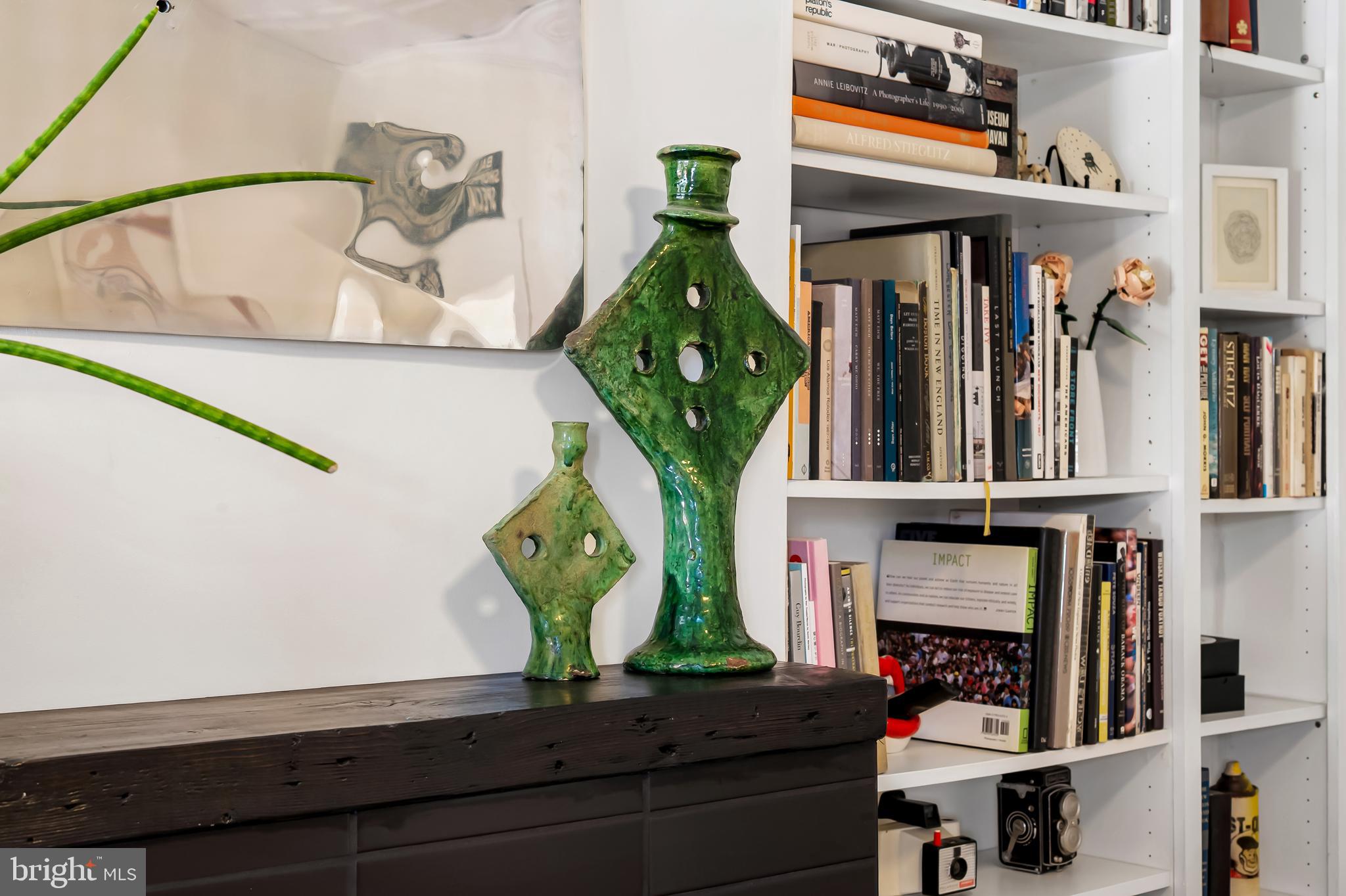3409 Keswick Road Baltimore, MD 21211 - Photo 7 of 49 a living room with fireplace furniture and a chandelier