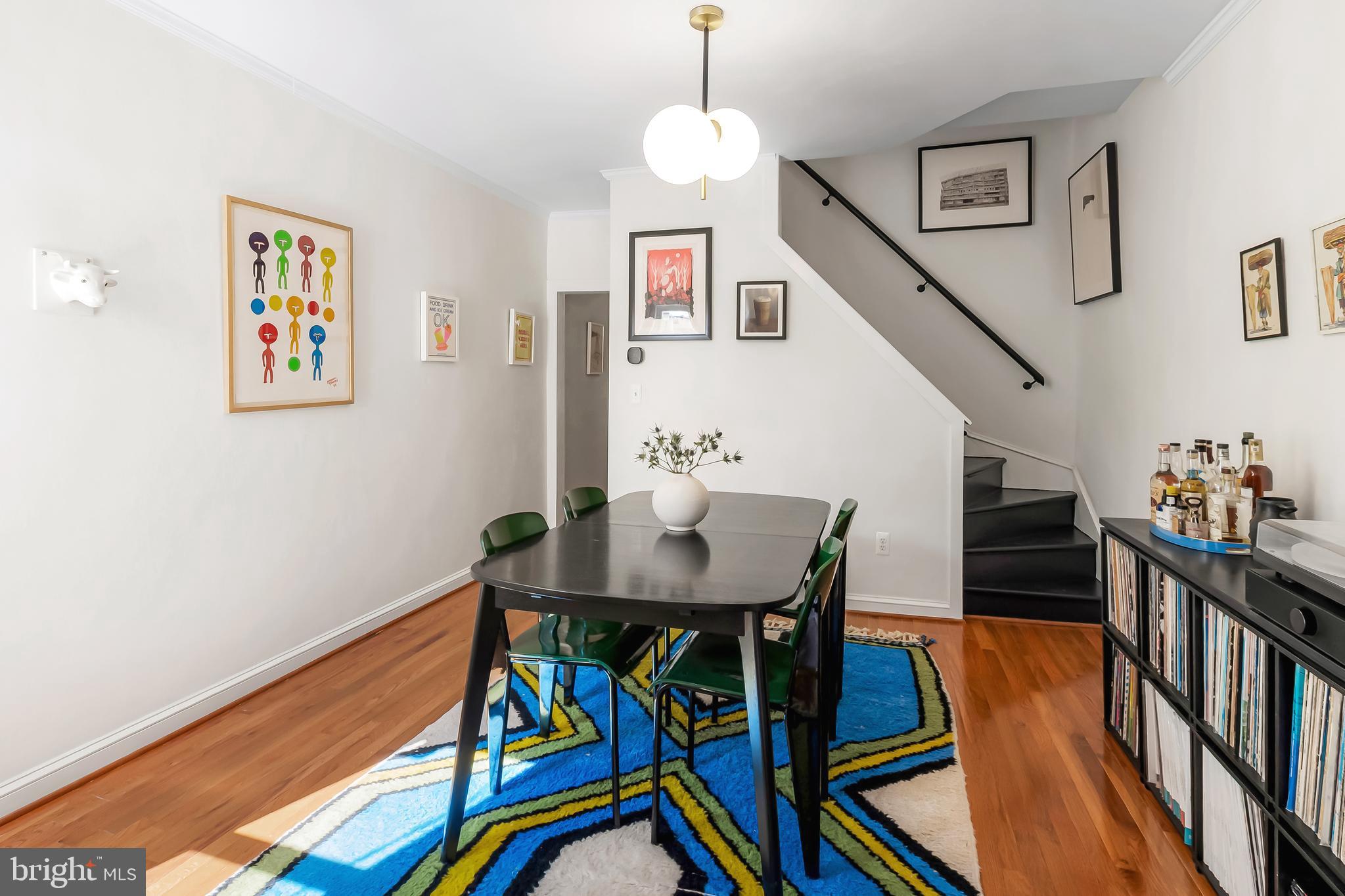 3409 Keswick Road Baltimore, MD 21211 - Photo 10 of 49 a dining room with furniture and wooden floor