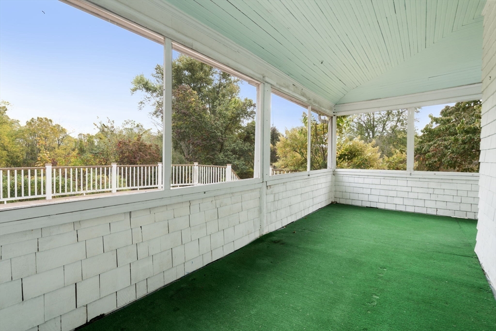 142 Pelham Island Road Wayland, MA 01778 - Photo 22 of 39 a view of a porch with a yard