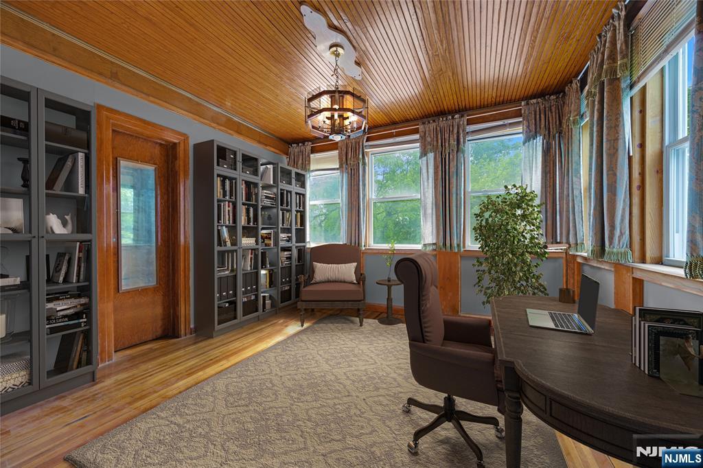 119 High Street Passaic, NJ 07055 - Photo 11 of 38 a livingroom with furniture and a potted plant
