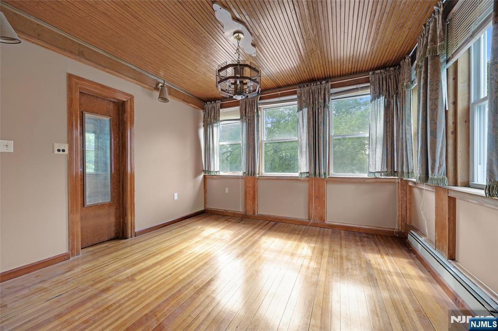 119 High Street Passaic, NJ 07055 - Photo 12 of 38 a view of an empty room with a window
