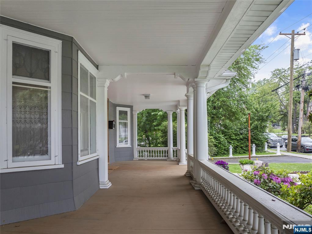 119 High Street Passaic, NJ 07055 - Photo 2 of 38 a view of a garden from the porch