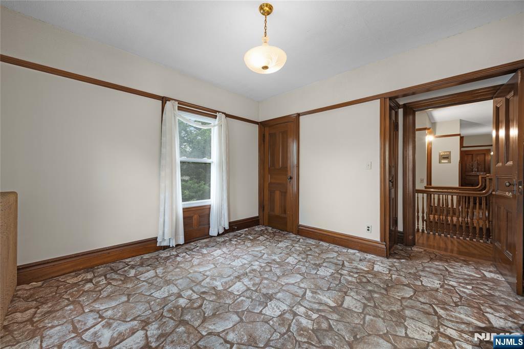 119 High Street Passaic, NJ 07055 - Photo 23 of 38 a view of an empty room with a window