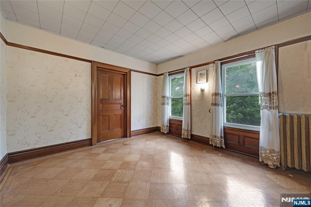 119 High Street Passaic, NJ 07055 - Photo 24 of 38 an empty room with windows
