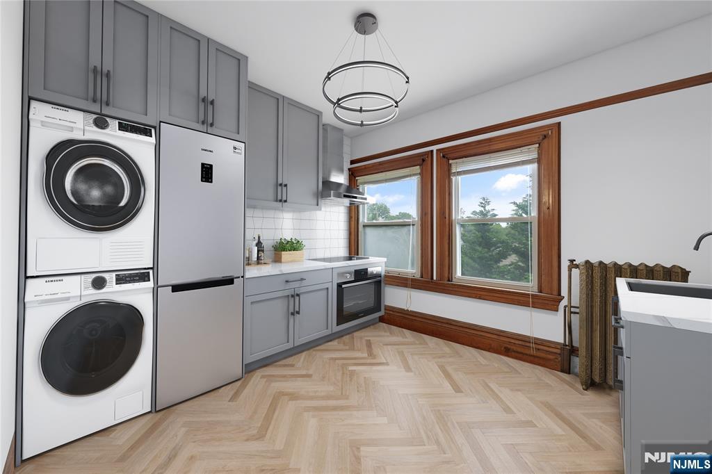 119 High Street Passaic, NJ 07055 - Photo 27 of 38 a view of a kitchen with sink washer and dryer