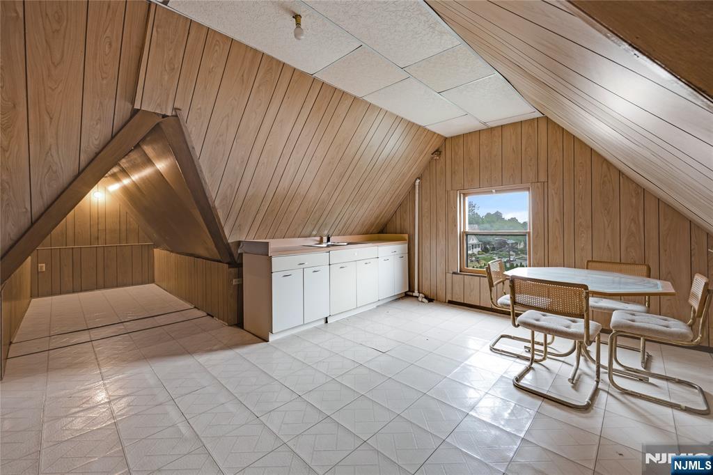 119 High Street Passaic, NJ 07055 - Photo 33 of 38 a view of a chairs and table in a backyard