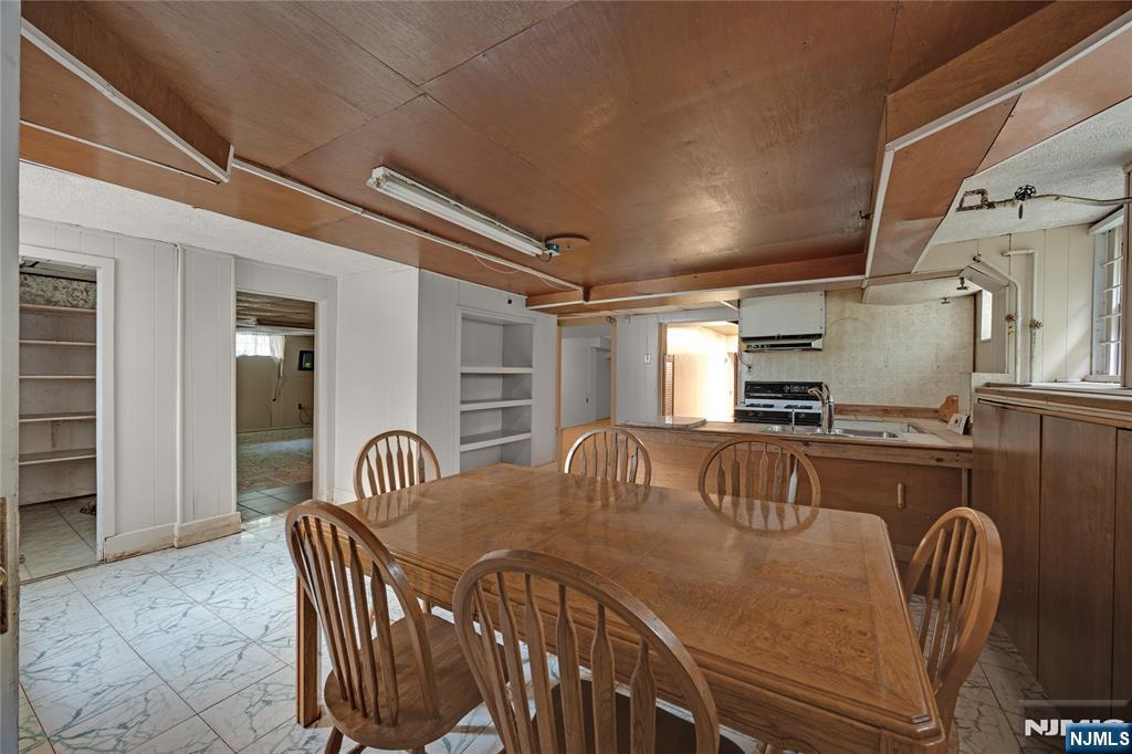 119 High Street Passaic, NJ 07055 - Photo 34 of 38 a dining room with furniture and window