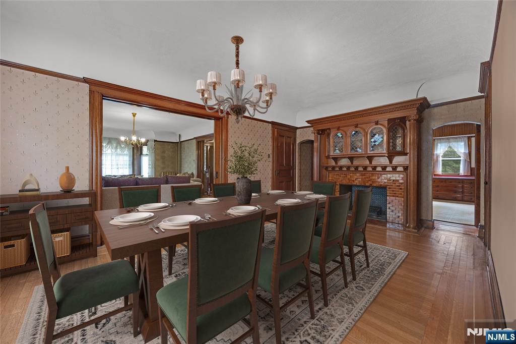 119 High Street Passaic, NJ 07055 - Photo 7 of 38 a view of a dining room with furniture window and wooden floor