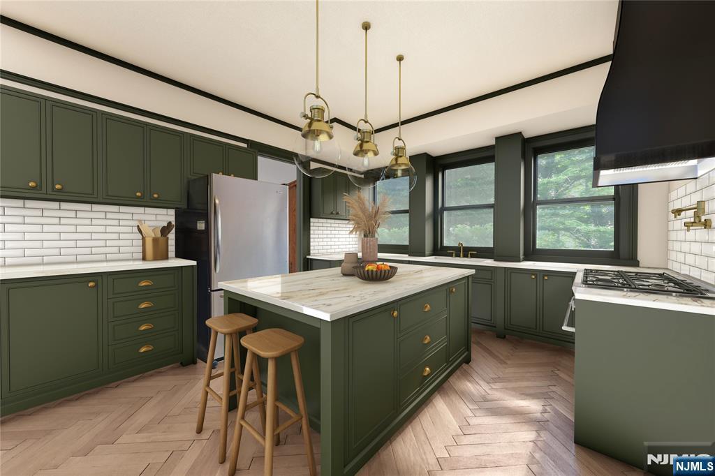 119 High Street Passaic, NJ 07055 - Photo 9 of 38 a kitchen with a stove and a refrigerator
