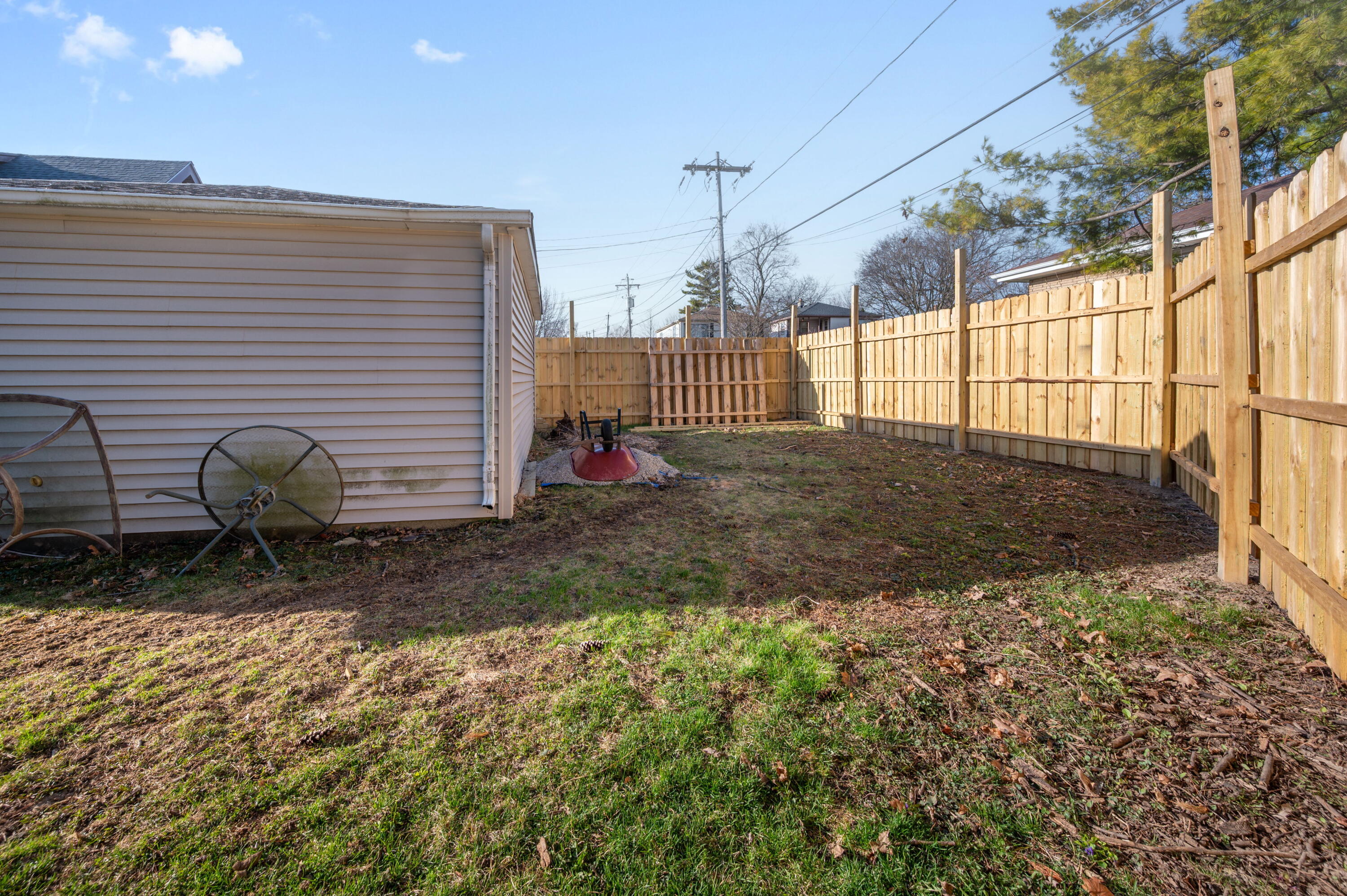 2571 South 68th Street Milwaukee, WI 53219 - Photo 27 of 32 Fencing Behind Garage