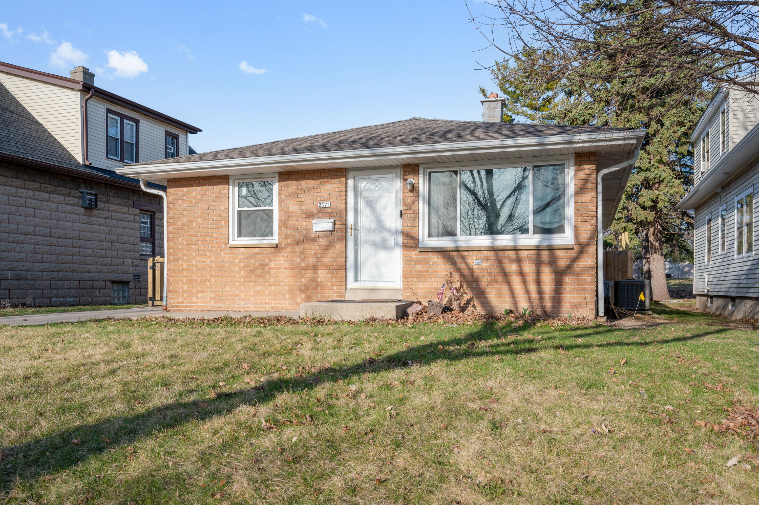 2571 South 68th Street Milwaukee, WI 53219 - Photo 2 of 32 Front w Grass