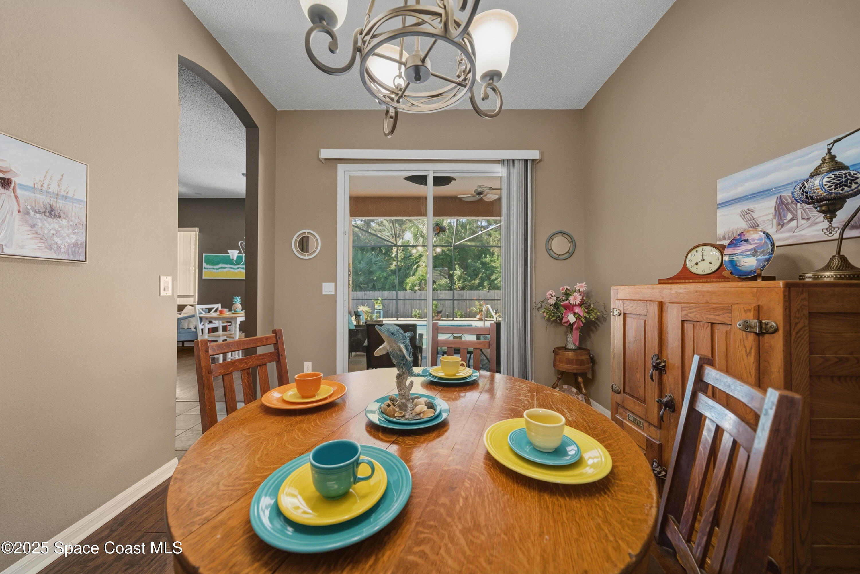 7368 Crepe Myrtle Court Cocoa, FL 32927 - Photo 19 of 50 a table and chairs in a dining room