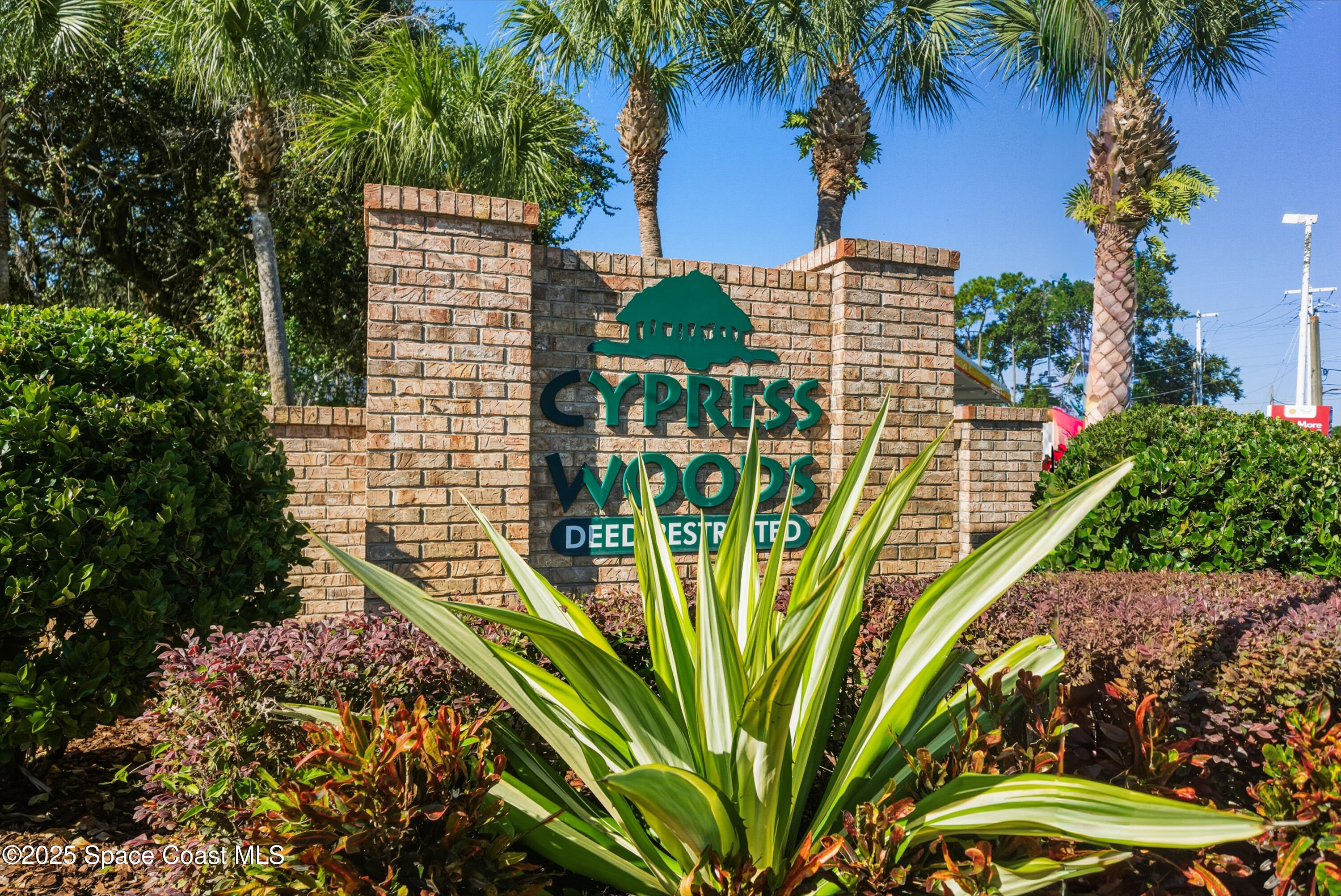 7368 Crepe Myrtle Court Cocoa, FL 32927 - Photo 48 of 50 a view of building with yard and entertaining space