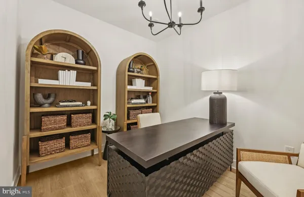 a view of livingroom with furniture and cabinet