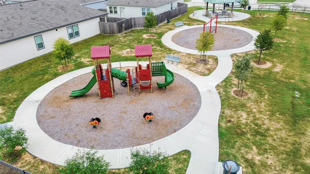 a view of a water fountain and a terrace