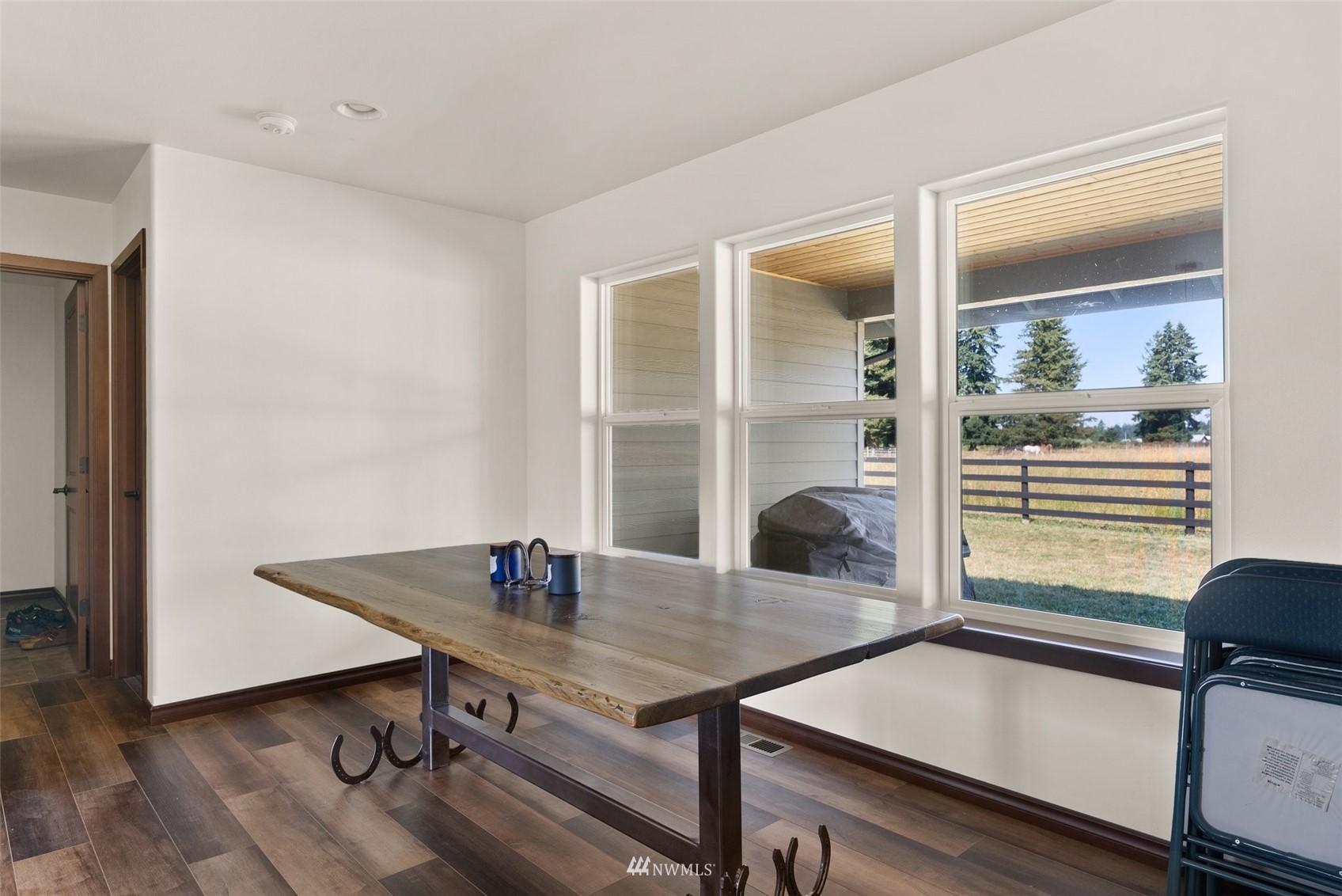 16622 Leitner Road Southwest Rochester, WA 98579 - Photo 12 of 29 a view of a workspace with furniture and window