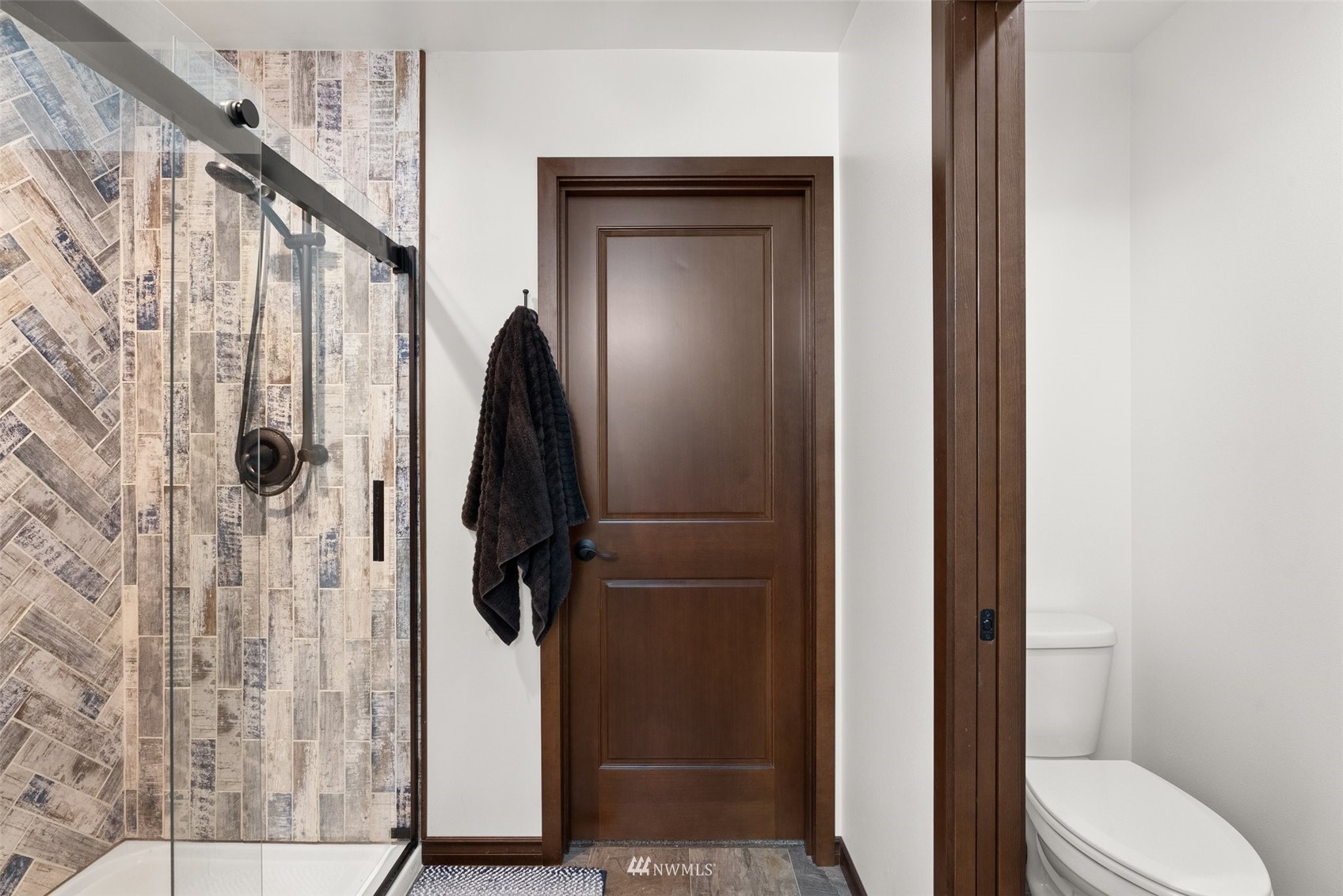 16622 Leitner Road Southwest Rochester, WA 98579 - Photo 20 of 29 a bathroom with a shower and toilet