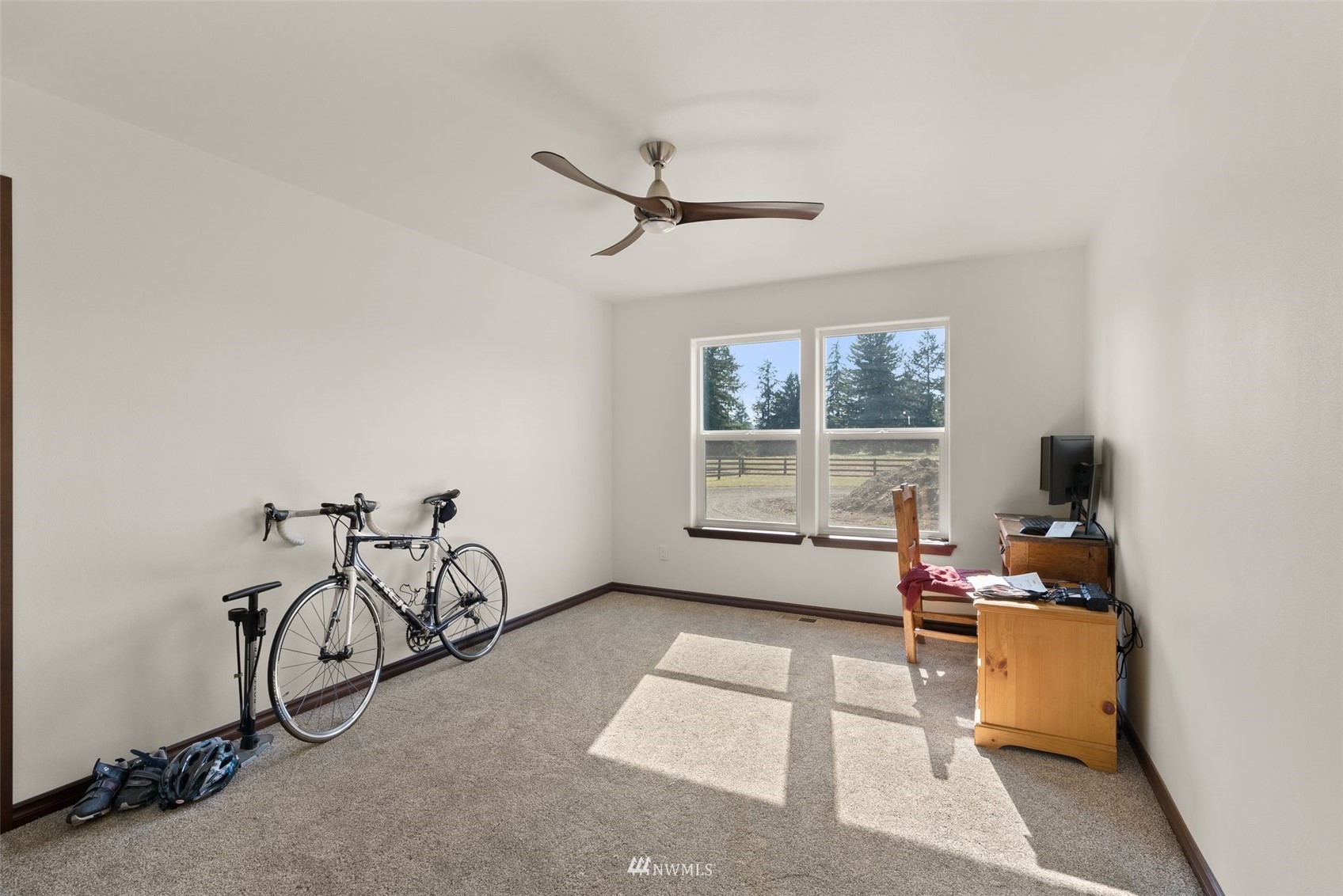 16622 Leitner Road Southwest Rochester, WA 98579 - Photo 22 of 29 a room with gym equipment and a large window
