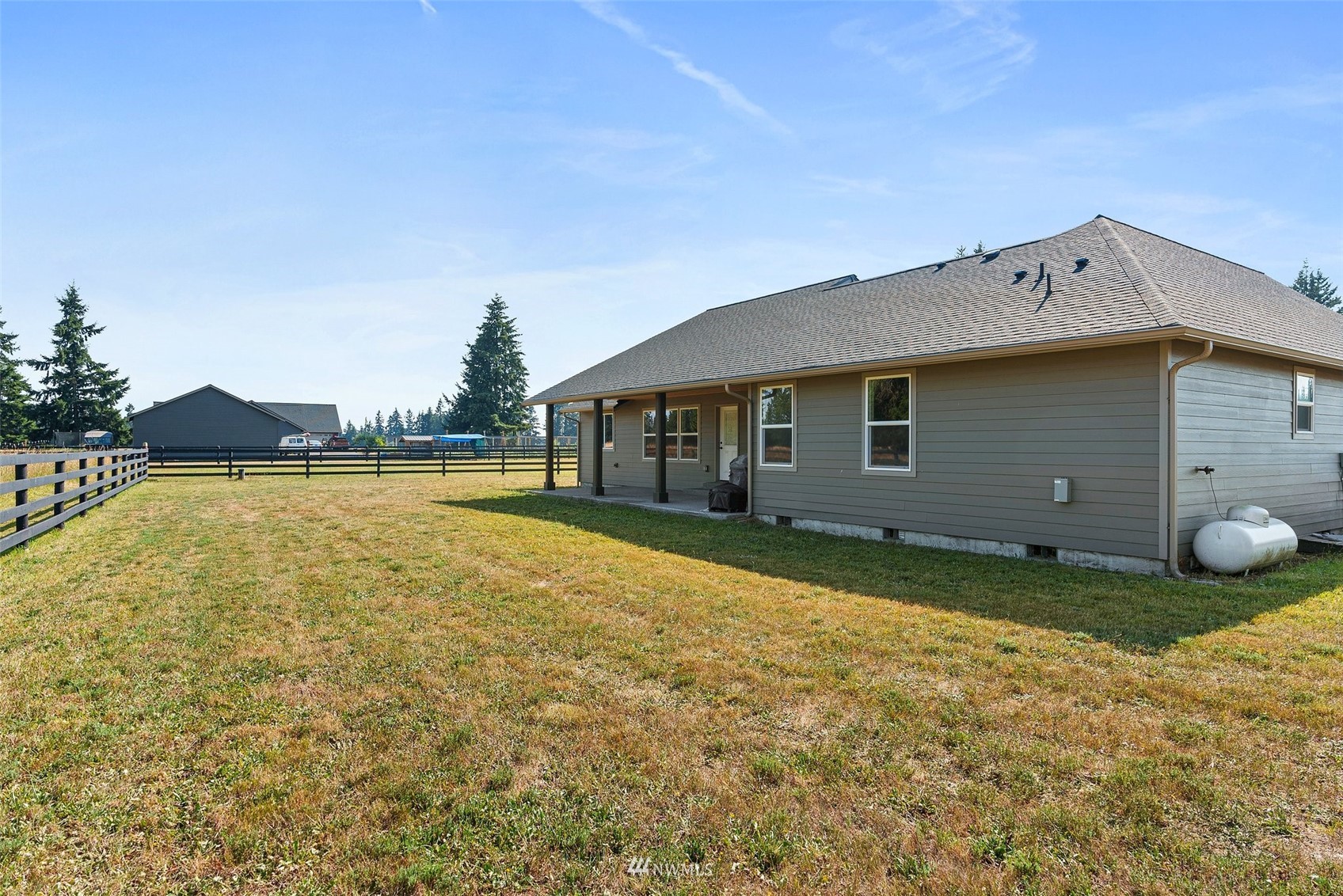 16622 Leitner Road Southwest Rochester, WA 98579 - Photo 24 of 29 a backyard of a house