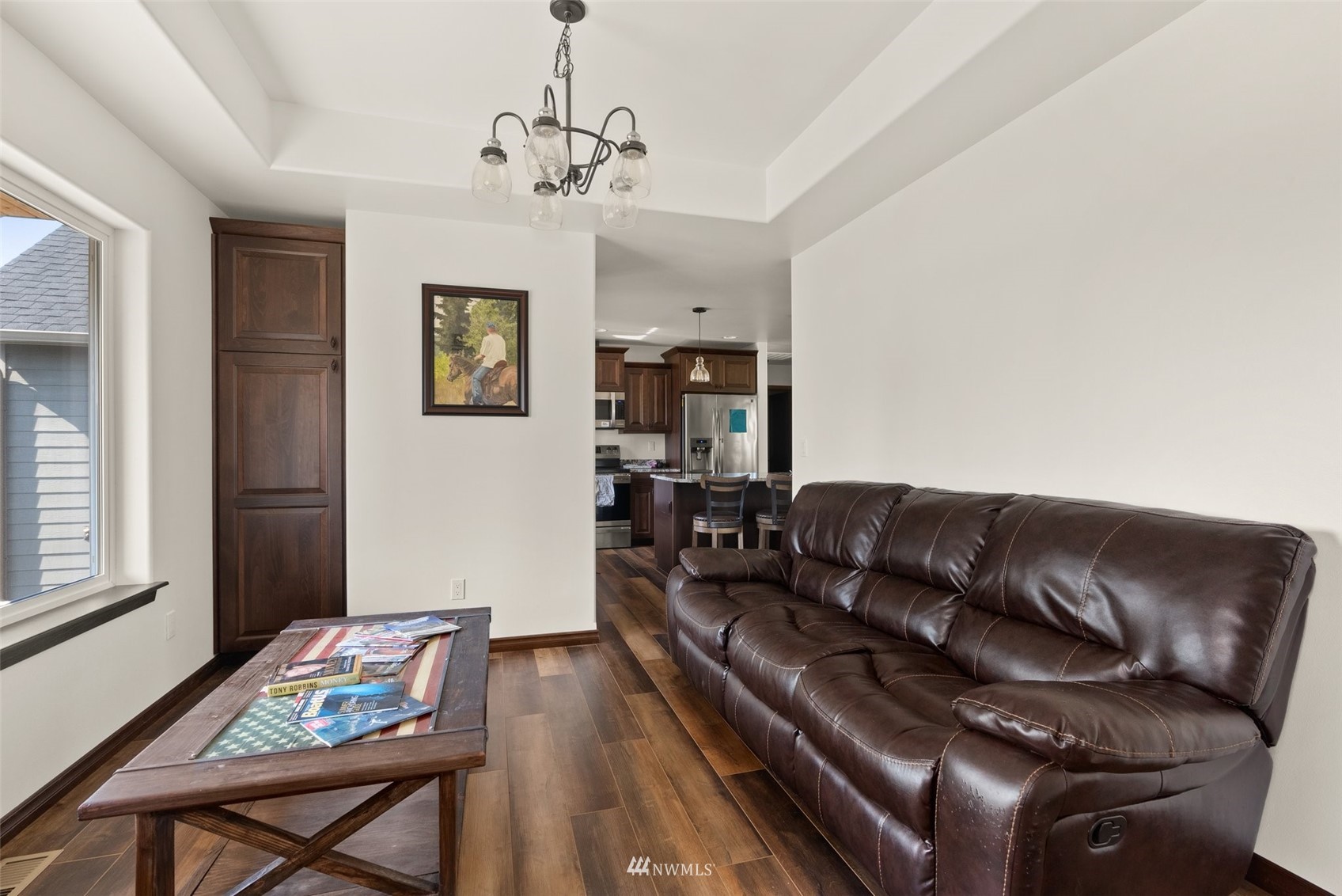 16622 Leitner Road Southwest Rochester, WA 98579 - Photo 8 of 29 a living room with furniture and wooden floor