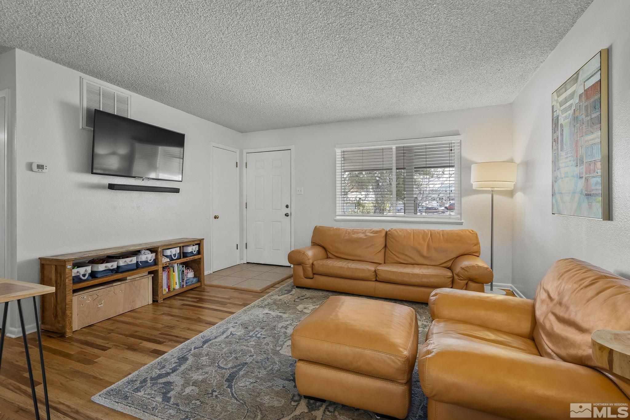 1370 Beldon Way Reno, NV 89503 - Photo 5 of 23 a living room with furniture and a window