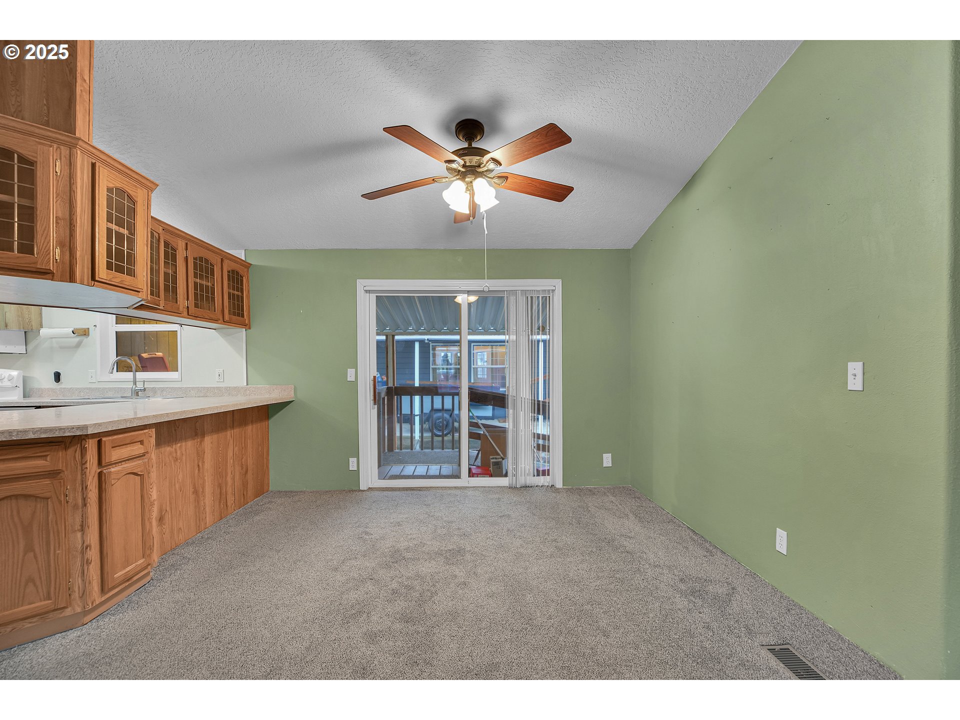 51459 Westlake Drive, Unit 102 Scappoose, OR 97056 - Photo 17 of 40 a view of an empty room with a window