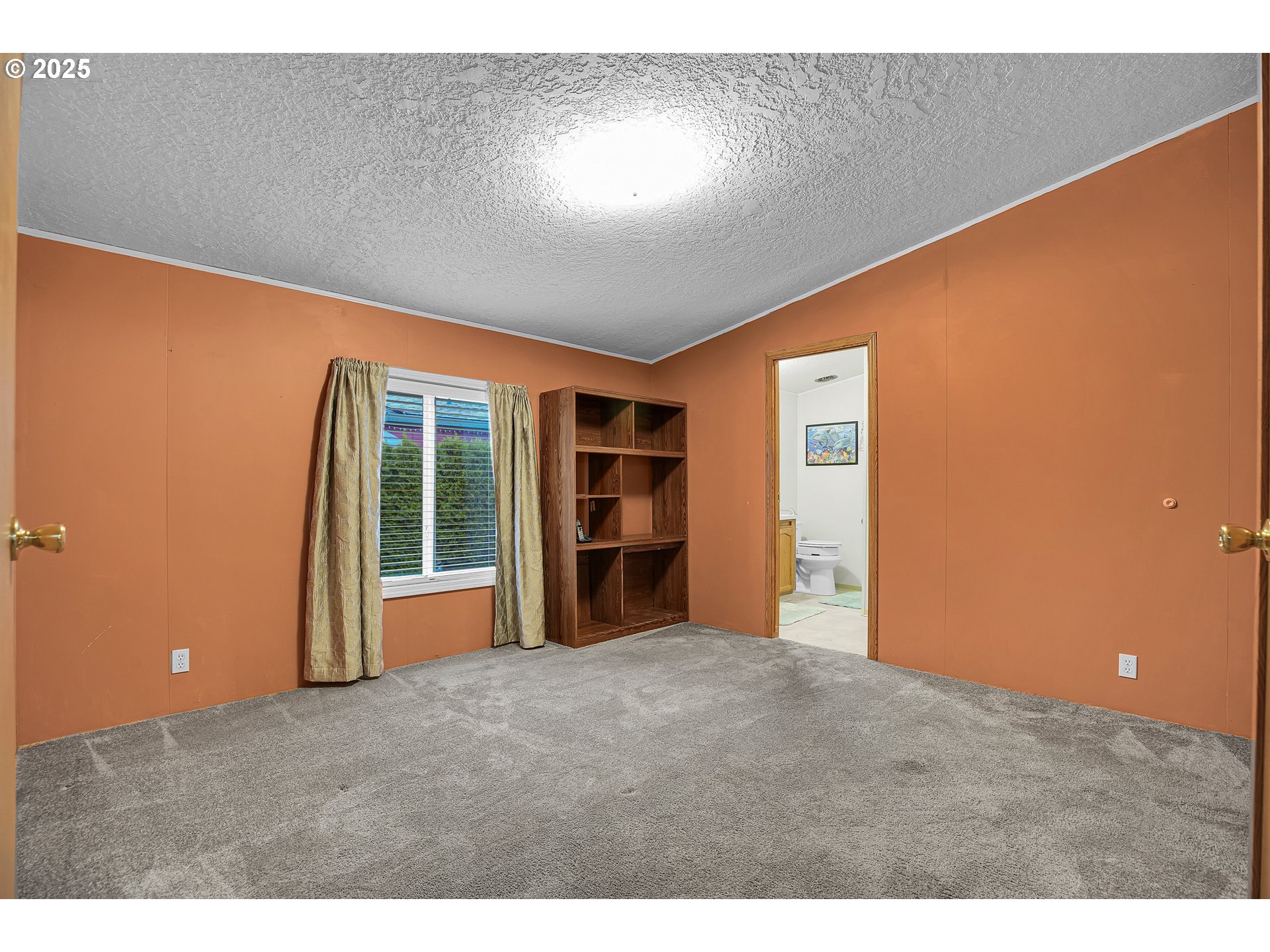 51459 Westlake Drive, Unit 102 Scappoose, OR 97056 - Photo 30 of 40 a view of an empty room with a window