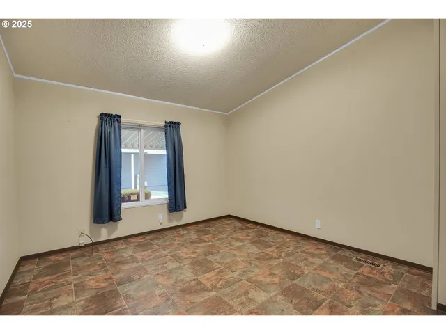 a view of a room with a hallway