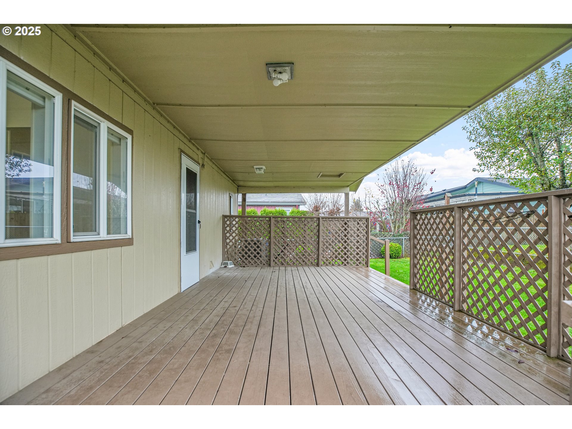 51459 Westlake Drive, Unit 102 Scappoose, OR 97056 - Photo 8 of 40 a view interior of a house with a wooden deck