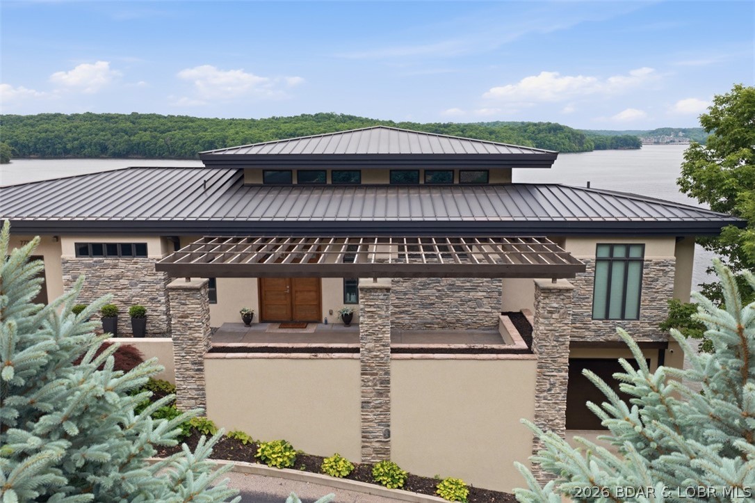 777 Malibu Road Osage Beach, MO 65065 - Photo 20 of 100 Warm organic tones and thoughtfully designed archi