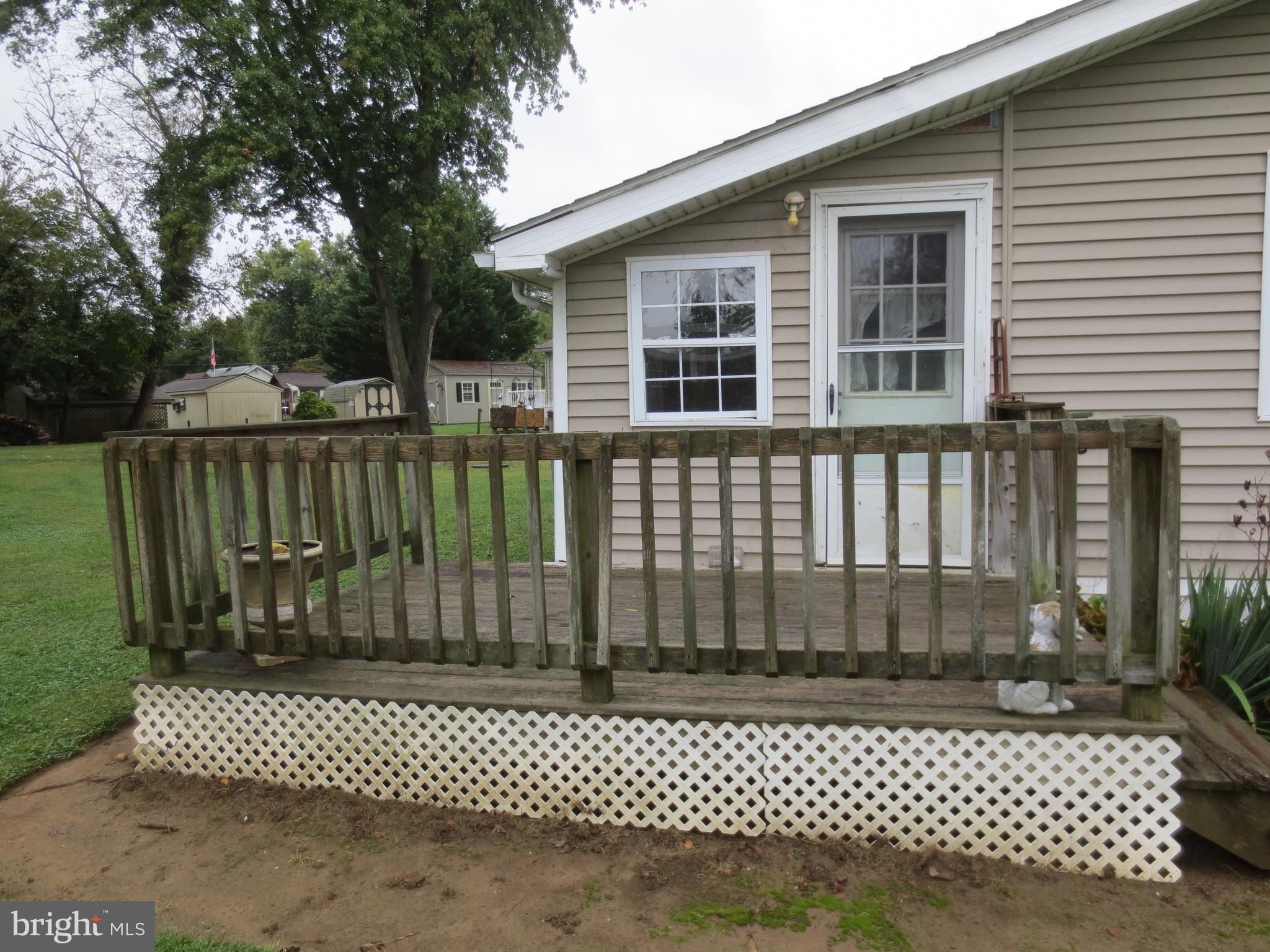 21 Hacks Point Road Earleville, MD 21919 - Photo 3 of 15 a view of a wooden deck