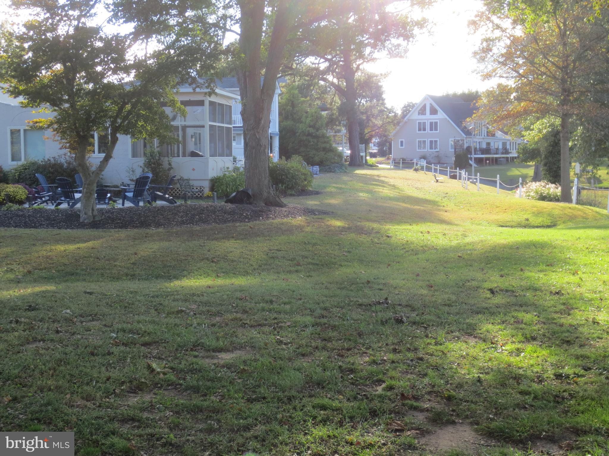 21 Hacks Point Road Earleville, MD 21919 - Photo 10 of 15 a view of a yard with a house