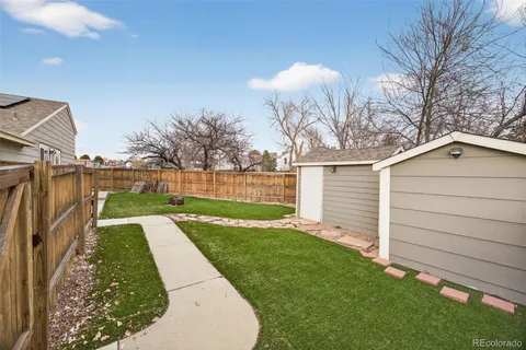 a view of backyard with green space