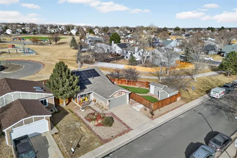an aerial view of a city with lake
