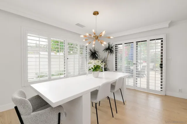 a large white bed in a white room